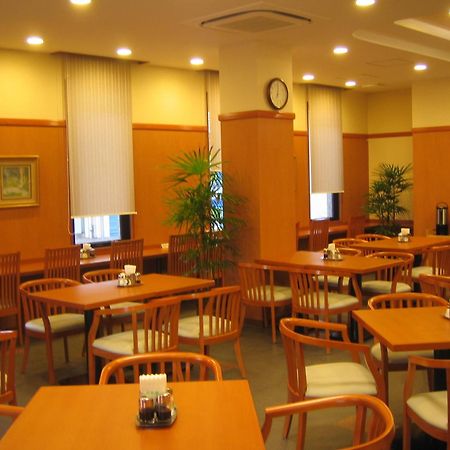 Hotel Route-Inn Kitakyushu-Wakamatsu Ekihigashi Bagian luar foto
